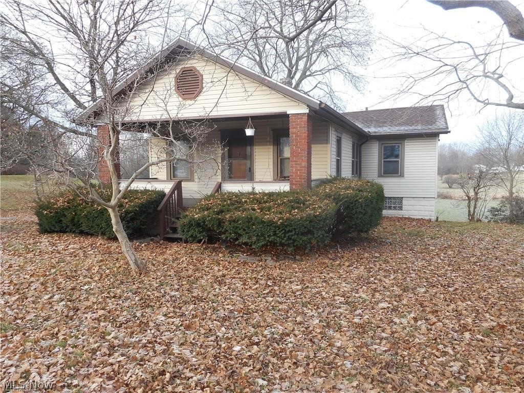 Quaint 3 bedroom ranch sits on nearly 1/2 acre lot and is affordable. Plenty of kitchen cabinet storage and offers a grand view of the private, backyard. Whether you enjoy the backyard deck or front porch swing next spring and summer, you will enjoy the seasons. Walk out unfinished basement. Great beginner home or investment opportunity. New roof - 2017.
