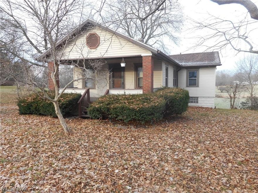 Quaint 3 bedroom ranch sits on nearly 1/2 acre lot and is affordable.  Plenty of kitchen cabinet storage and offers a grand view of the private, backyard.   Whether you enjoy the backyard deck or front porch swing next spring and summer, you will enjoy the seasons.  Walk out unfinished basement.  Great beginner home or investment opportunity.  New roof - 2017.