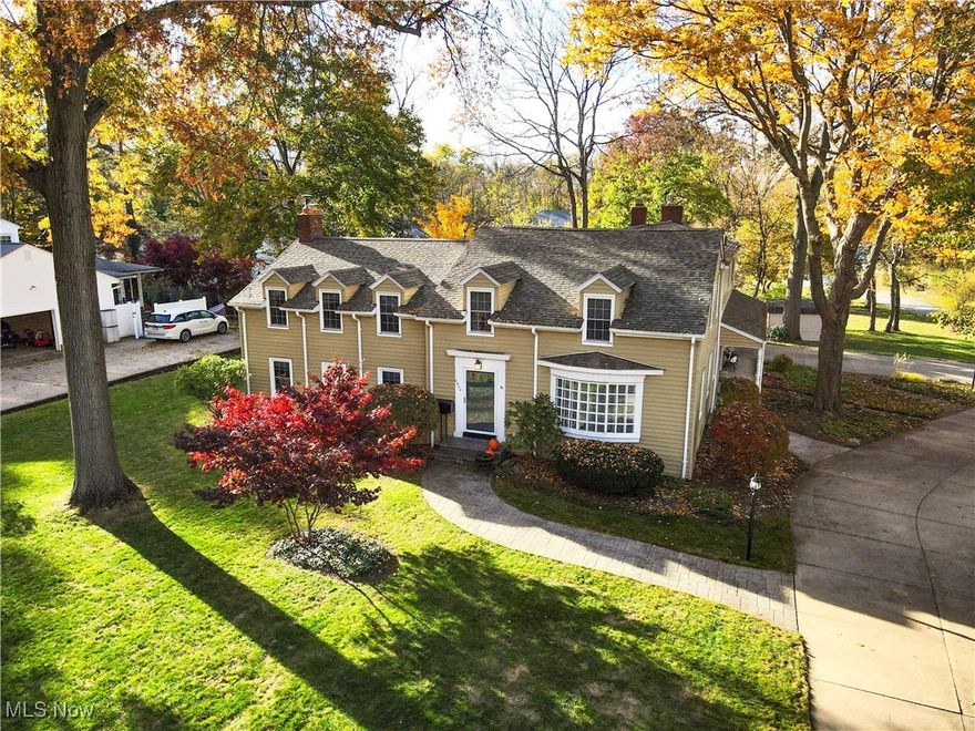 Location, Location, Location - Welcome to Silver Lake Estates!  This impressive & rarely available home offers 4-5 bedrooms, 2.5 baths, and an abundance of natural light through the many windows, space, charm, and character. Built in 1932, it features beautiful hardwood floors throughout most of the home, solid 6-panel wood doors & custom built-ins.  The living room features a bay window, crown molding and built-ins.  There is also crown molding in the Dining room.  The layout is both spacious and functional & offers 2 family rooms both with fireplaces adding warmth this winter. The kitchen offers ample beautiful cherry cabinetry, pull out drawers in the pantry, separate vegetable sink, nice counter space & recessed lighting.   The eating area offers nice space for meals.   A gorgeous 4 season sunroom & half bath complete the first floor.  The bedrooms are exceptionally large and have nice closet space - one of the bedrooms offers a 11' x 5' walk in closet and the primary bedroom has three closets!  If you don't need 5 bedrooms, use one as an office, sewing room - whatever fits your needs.  The unique dormers give the home personality and architectural interest you just don’t see every day in a colonial style.    Lots of closet space in the hallways including a cedar closet.  One of the full baths has been updated with a walk in shower & double vanities.  Enjoy the seasons sitting on your covered side porch or patio.  The basement offers a recreation room and plenty of storage. There is a double entrance driveway and is accessible from Millboro and Ivanhoe, which offers a lot of parking.  The stamped, concrete sidewalks are very nice.  Located within steps to Silver Lake Elementary School, the Lake/and area amenities, this home perfectly blends vintage character with comfortable, flexible living. Home warranty is being offered to the buyer from the seller.  Hot water tank - 2024, Roof - 2011.  This is a truly special property you won’t want to miss!