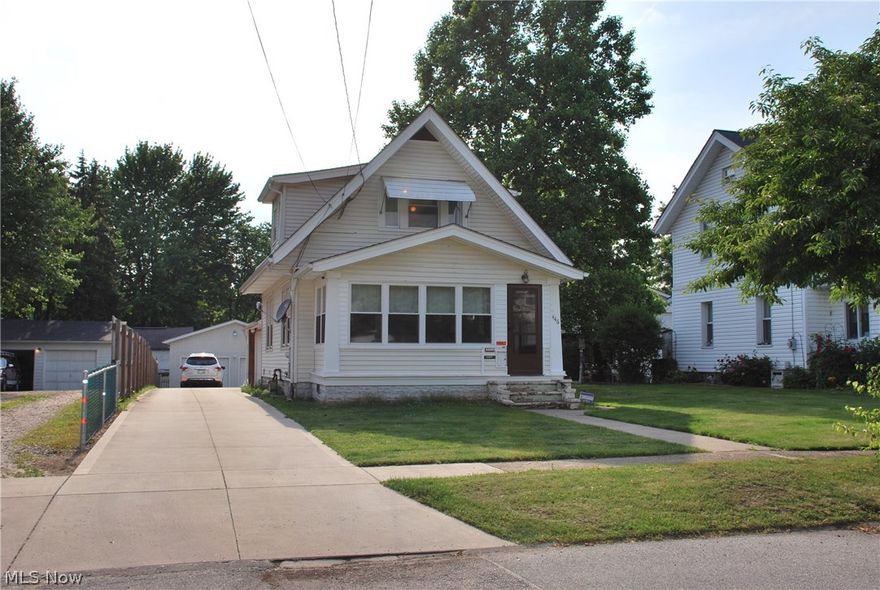 Wonderful home in this sought after area! Nicely cared for homes in surrounding area as well! Hardwood Floors in both Living Room & Dining Room! Kitchen storage area has been extended by using stair opening as a pantry space & very functional for preparation & cooking. The enclosed front porch is a finished space to extend living space as a quiet reading area. The bathroom has been completely remodeled & the tub & shower have the BathFitter system & looks GREAT! The 3 bedrooms upstairs all have hardwood floors & the middle bedroom is currently being used as a walk in closet but easily converts back to a bedroom! The driveway & large parking area have all been concreted to provide ample parking space & access to the 2 separate garages! The attached garage is currently being used for storage/workshop & has rear man door. The detached garage is of post & beam construction & has electrical panel & lots of space! It also has 2 separate garage doors & side man door with lots of storage! Huge
