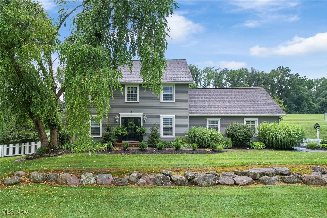 This beautiful home sits on 5 well-manicured acres and offers a perfect blend of charm, space, and updates. Step into the inviting living room with a cozy Pottery Barn feel that flows into the formal dining area. The massive chef's kitchen boasts abundant storage, an eat-in space and an open lay out. The main floor includes a spacious owner's suite with a soaking tub, shower and walk-in closet, plus the second bedroom, full bath, and laundry room. A stunning sunroom overlooks the in-ground pool and expansive backyard. Upstairs features a second owner's suite, three more bedrooms and two full baths. The finished walkout basement is a true bonus with a second kitchen, family and rec rooms, an office, full bath, laundry, wood-burning stove, and ample storage. This home offers incredible indoor and outdoor living, ideal for entertaining or relaxing. Shown by appointment only to qualified buyers.