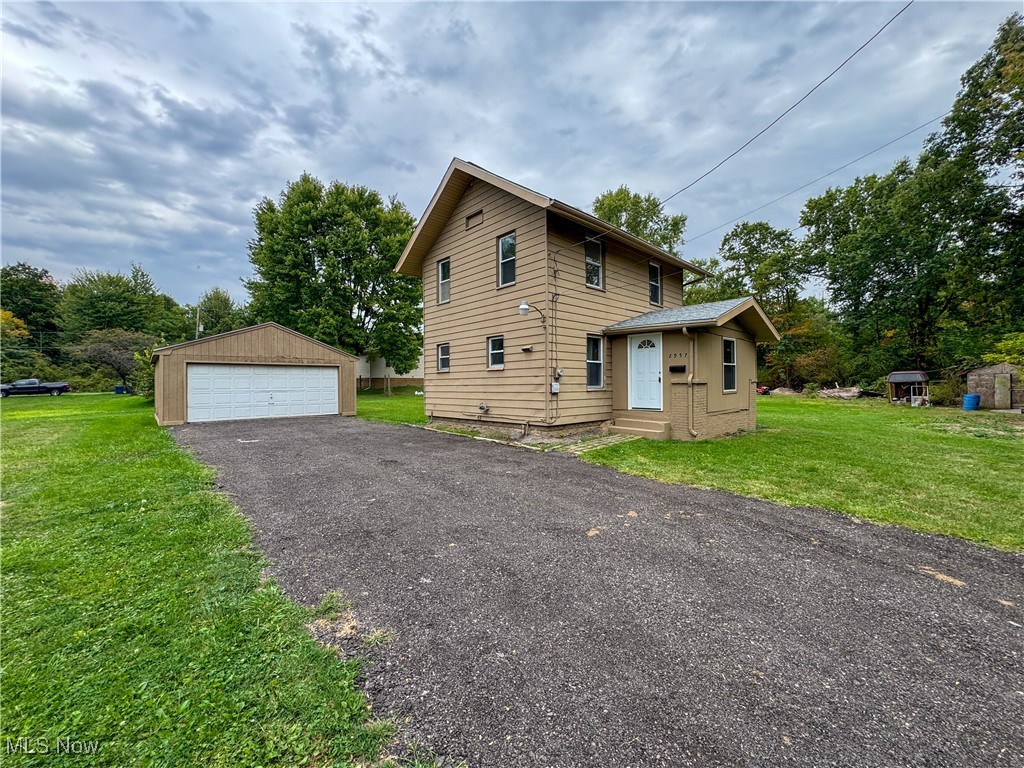 Welcome to your new home. This place is fully updated and move in ready! Situate on a large private lot, the area is known for the nearby hiking and ATV trails. This private parklike area brings wildlife like deer to visit the house regularly. Oversized 2 car detached garage provides ample storage together with the newly paved driveway, there's plenty of parking room. Inside the home features new paint and flooring, light fixtures throughout, bright open rooms throughout the first floor. Upstairs there are 4 bedrooms. Full basement. Among the many updates in this house are new roof and furnace.