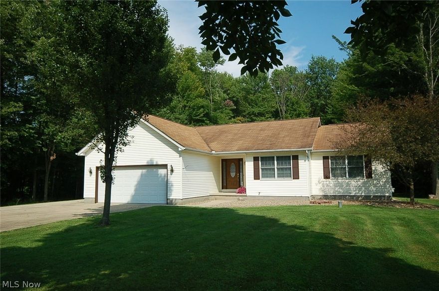 Check out this wonderful 3 bedroom, 1.5 bath ranch located on a dead end street on over a half acre lot. And, the really great thing about it is that there is nothing between you and Mosquito lake except for about a 5 minute walk through the woods and, from Fall to Spring, you can watch the sun rise over the lake from the house. This home features: A nice large eat in kitchen including appliances; Comfy living room with wood burning fireplace; 1st floor laundry; Huge screened back porch with sky lights and adjacent patio; Full basement; Extra concrete parking pad for boat, RV, etc.; Backyard storage shed; Brand New Septic system!!; Home Warranty too!!