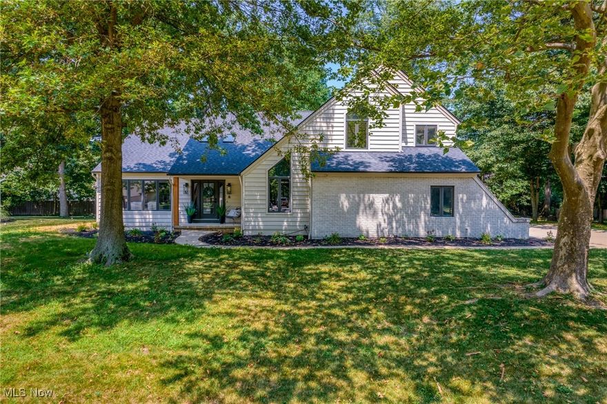 Welcome to this beautifully updated four-bedroom, three-bath colonial on an oversized lot in the sought-after Westwinds community of Avon Lake. This home has been thoughtfully renovated throughout with quality finishes and attention to detail.

The first floor features luxury vinyl flooring and custom wainscoting that adds character and warmth throughout the home. The spacious front living room offers vaulted ceilings and great natural light, while the cozy family room includes a gas fireplace and an updated bar area, perfect for entertaining. A remodeled half bath adds convenience, and sliding glass doors lead to a private back deck ideal for relaxing or gathering with friends.

The kitchen offers granite countertops, plenty of cabinet space, and brand new stainless steel appliances. Upstairs, you’ll find four generously sized bedrooms, including an impressive primary suite with dual walk-in closets and a spa-like bath complete with a double vanity, walk-in tiled shower with glass surround, and a soaking tub. A refreshed hall bath and convenient second-floor laundry room complete the upper level.

The newly finished basement adds versatile living space, along with plenty of storage in the unfinished section. Major updates include a brand new roof, furnace, A/C, hot water tank, front door with sidelights, interior doors, lighting, and plumbing fixtures, along with countless other high-ticket improvements that make this home truly move-in ready.

Situated in one of Avon Lake’s most desirable neighborhoods, this home is a rare find. Don’t miss your chance to make it yours!