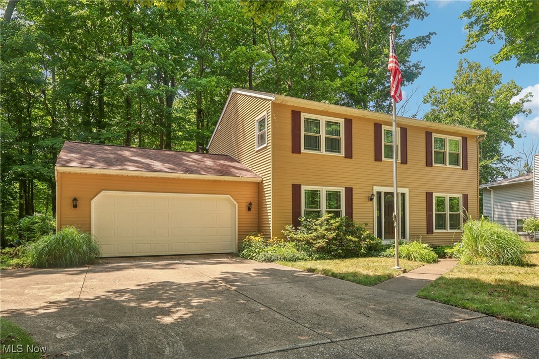 Welcome to your dream home located in the vibrant heart of Mentor! 4-bed, 2.5 bath colonial is set on a private, wooded lot that provides a peaceful sanctuary just moments from local amenities. The spacious family room features a cozy fireplace, perfect for relaxing evenings or gathering with friends and family on chilly nights. The eat-in kitchen comes fully equipped with all appliances included, ample cabinet and counter space to ensure both practicality and style for everyday living and entertaining. The primary bedroom, features an ensuite bath for your own personal oasis. It is also attached to a secondary bedroom that could be conveniently used as a nursery. Three additional bedrooms provide plenty of room for family, guests, or a dedicated office space. A full basement offers endless possibilities for a home gym, workshop, or additional storage. Step outside and enjoy the serenity of your private, wooded backyard—ideal for morning coffee, weekend barbecues, or quiet moments surrounded by nature. Convenient location near shopping, dining, parks, Lake Erie beaches and marinas. Don’t miss your chance to own this exceptional colonial home in one of Mentor’s most desirable neighborhoods. Schedule your private tour today and experience the perfect harmony of comfort, style, and natural beauty!