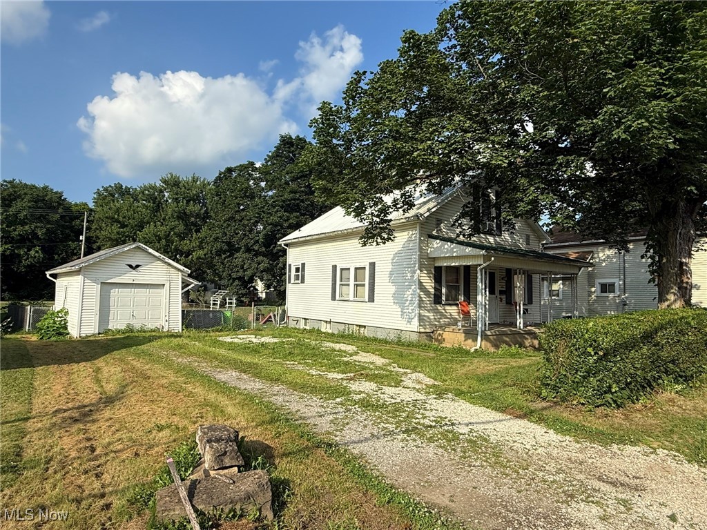 Investment opportunity. 2 bedrooms, vinyl sided home, needs TLC. 200 amp electric. Detached garage. Deep 269' level lot. Tenant occupied, 24 hour notice to show.