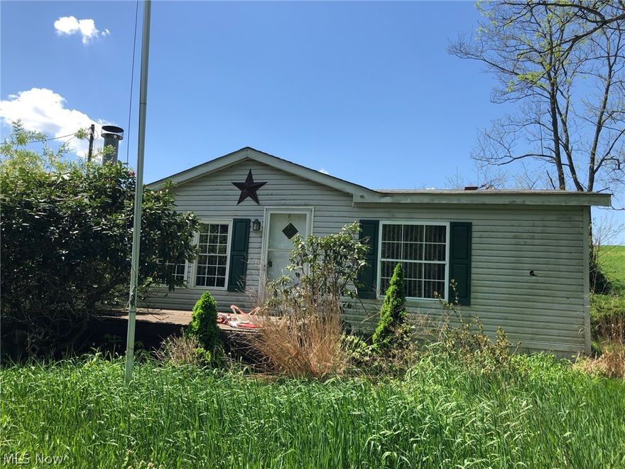 Three bedroom, 2 full baths, doublewide home on 2 acre lot. Home has well water & septic system, conditions unknown. Home selling AS IS.