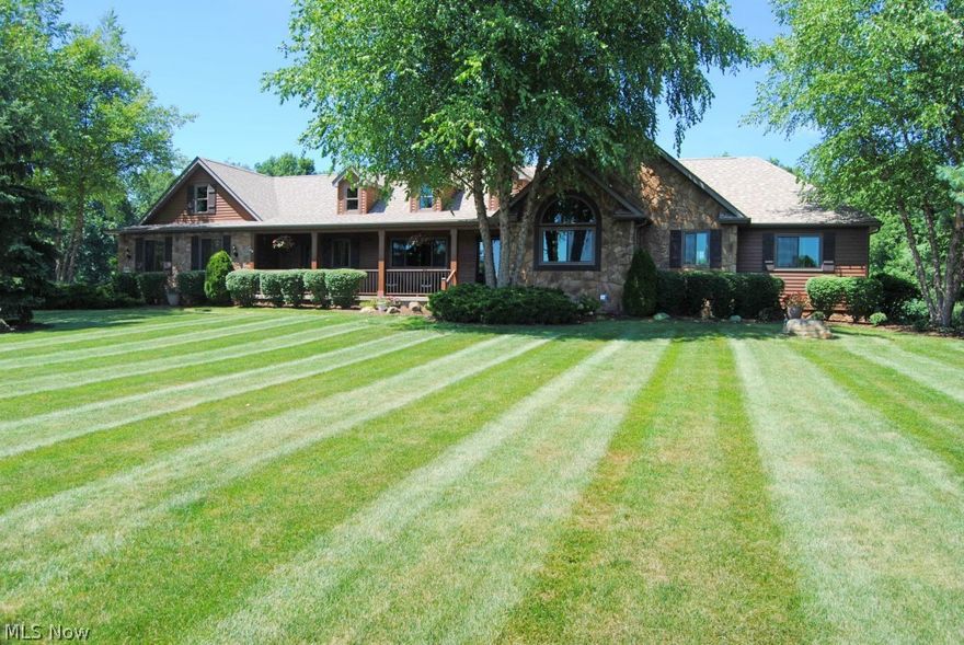 Custom built 4 bedroom+, 3.5 bath ranch on spacious 3 acre lot in Sharon Township (Grandview Farms). Great open floor plan w/dramatic high ceilings.  Large, newly remodeled gourmet kitchen with new stainless steel appliances and large granite island.  Kitchen opens to Great Room with wall of windows and stone fireplace.  Master suite with newly remodeled, spa quality master bath.  2 additional bedrooms on the main level with Jack & Jill bath.  Over 2,000 sq/ft in the finished walkout lower level.  Family room features sit down wet bar/kitchenette, 1-2 bedrooms, full bath, & a rec room  Great potential for teen or in-law suite.  First floor laundry room.   Enjoy outdoor entertaining on spacious deck or stone patio.  Large, open flat backyard.  Fenced garden.  Outdoor shed to store lawn equipment .  3 car side loading garage.  Many, many recent improvements including new roof, siding, windows, doors, furnace, AC, lighting & more!  Highland school district.