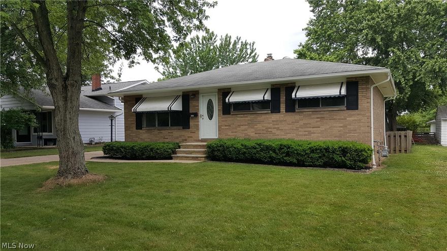 Nicely updated Brick Ranch, Kitchen has new stainless steel range, microwave & dishwasher. Also new solid vinyl interlocking floor. All new paint throughout. Updated bath, new carpeting. Lower level has finished rec. room and a office or 4th bedroom. Easy to get to 480 & 71 or 77.