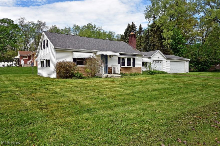 **Don't miss this outstanding opportunity**  Situated in Jackson Township this ranch features 2 good size bedrooms, 1 full bath, a large living room with fireplace, kitchen equipped with range and refrigerator, large laundry room, and a nice 3 car garage offering plenty of room for parking and storage.  All of this on a corner lot at an amazing price!  "Sold AS-IS" This will go fast!  Schedule your showing today!