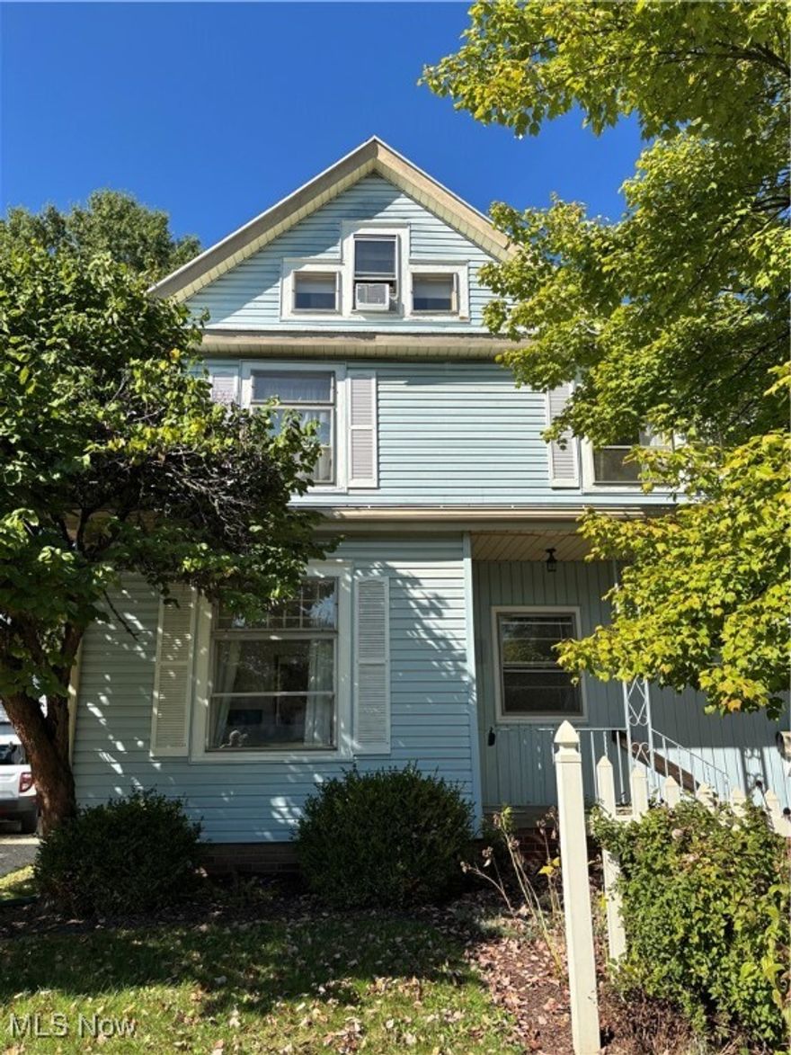 Beautiful and well cared for older home with 2.5 stories in a much desired North Canton location. The home has been duplexed with an apartment on main level and an apartment on the second floor with a finished attic room. Each apartment has its own entrance. The basement is shared. Right side has the main floor apartment laundry and left side has the upper apartment laundry. There are also two separate rooms in the basement. Utilities are separate for each apartment, with the exception of North Canton utilities (Water, Trash, etc.) which is paid by the landlord. The deck has a portable screen room and a ramp that leads to the shared parking area. Property sells As-Is.