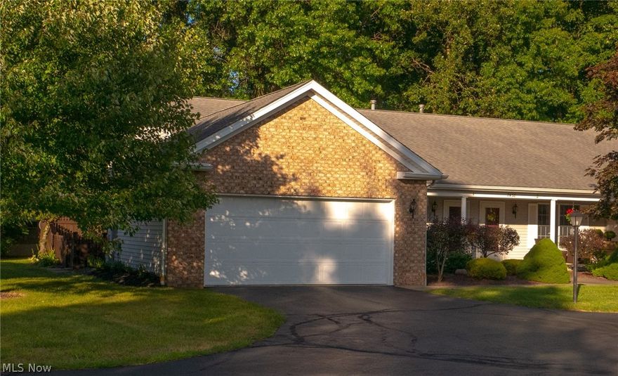 Experience easy-living in this one-story condo situated in the Huntington Woods area of Boardman.  The kitchen and dining room were updated and combined into single area in 2018.  New stainless appliances, granite countertop, new cabinets, and vinyl flooring showcase the upgrades to these rooms.  The vinyl flooring continues into the living room and throughout the hallways and closets.  Two large carpeted bedrooms along with two full bathrooms make this ranch perfect for anyone.  A two-car garage, private patio, and wooded setting allows for a peaceful setting to relax or entertain.  The main floor laundry including washer and dryer adds convenience to this spacious home.  With a low HOA fee ($125), this condo is an ideal home for someone starting out or entering their golden years.  Close to shops, restaurants, parks, this condo is found in the heart of Boardman and Rt 11.  Agent Owned.