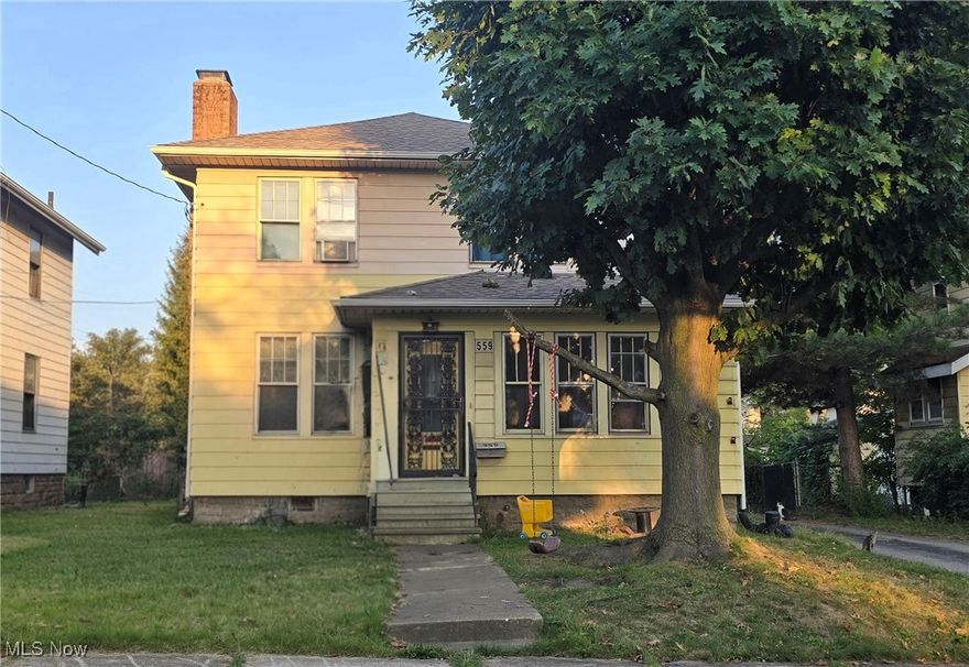 This classic home is filled with charm and possibility. A spacious first floor showcases beautiful hardwood floors and rare, natural unpainted woodwork nearly throughout. The layout includes a living room with fireplace and built-in cabinetry, a dining room with French doors, and a kitchen, along with bonus spaces — a family room and a light-filled solarium with additional built-ins and walls of windows, perfect for relaxing or entertaining. A full bathroom on the main level adds flexibility to the floorplan. Upstairs are three well-sized bedrooms and another full bathroom. The lower level offers an exceptionally large basement with a designated work area and one finished room that could serve as a 4th or 5th bedroom, office, or flex space. Outside, the rare three-car block garage provides excellent parking and workshop potential. Major improvements have already been made with a newer roof, furnace, central air, and water tank. With its large footprint, authentic woodwork, and valuable updates, this home presents both character and opportunity in a convenient location.
