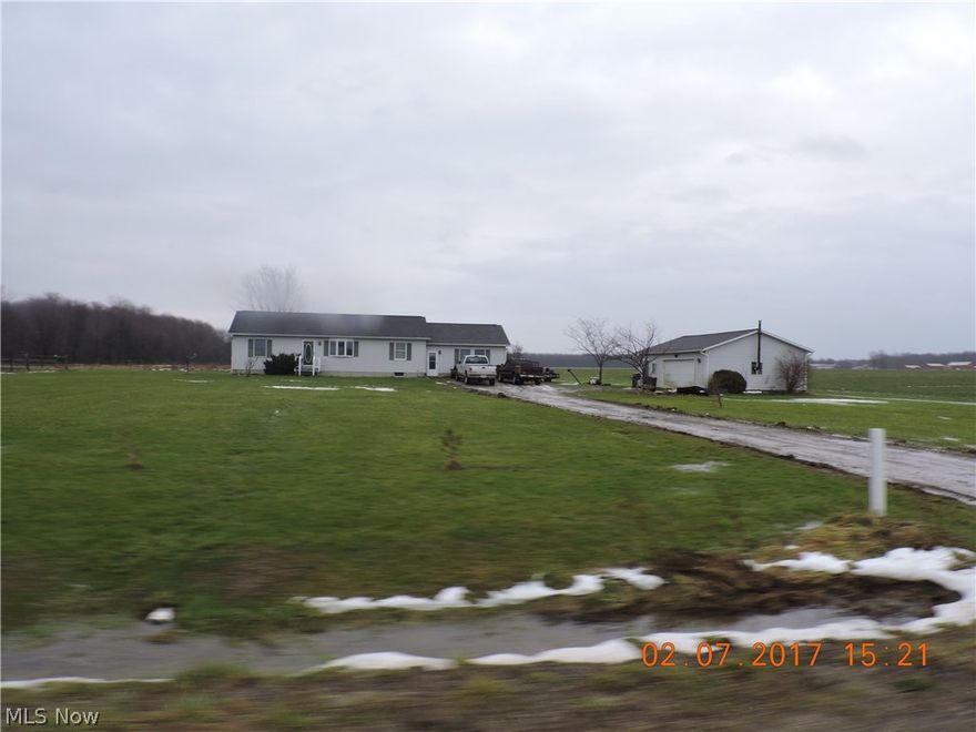 Ranch style vinyl sided home setting on 6.18 acres in Monroe Township. This home features 3 bedrooms, 2 full baths, formal living room, large family room and modern kitchen. The full unfinished basement and 2 car detached garage adds more storage.