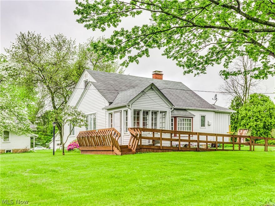 Cape home located in Uniontown on just over 4 acres of land. This home highlights a bright living room and formal dining room both with arched doorways. The eat-in kitchen includes all appliances and a wonderful island perfect for morning coffee, guests as you prepare meals or even homework time. Enclosed sunroom with great views out to the property, knotty pine family room or office, A Bedroom and full bathroom complete the first floor of this home making Cape ideal for one floor living with room for guests. Have a family in mind, no need to worry upstairs there are 2 huge bedrooms in knotty pine with built ins with lots and lots of storage. Full basement with utility area and laundry room complete this awesome cape. Outdoors WOW what a yard, small deck with stairs and ramp, patio area, 2 car detached garage, Barn and another garage built with larger vehicles in mind, was used for RV storage with a high door. You won’t want to miss out on this home, call today to schedule your showing