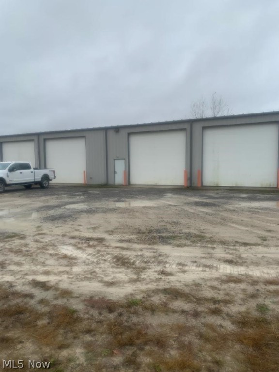 Great business opportunity! Industrial business on 3 acres with approx. 8000 sq ft. Shop has half bath, propane heat, and public water. The company office is an older mobile home w/1.5 baths.