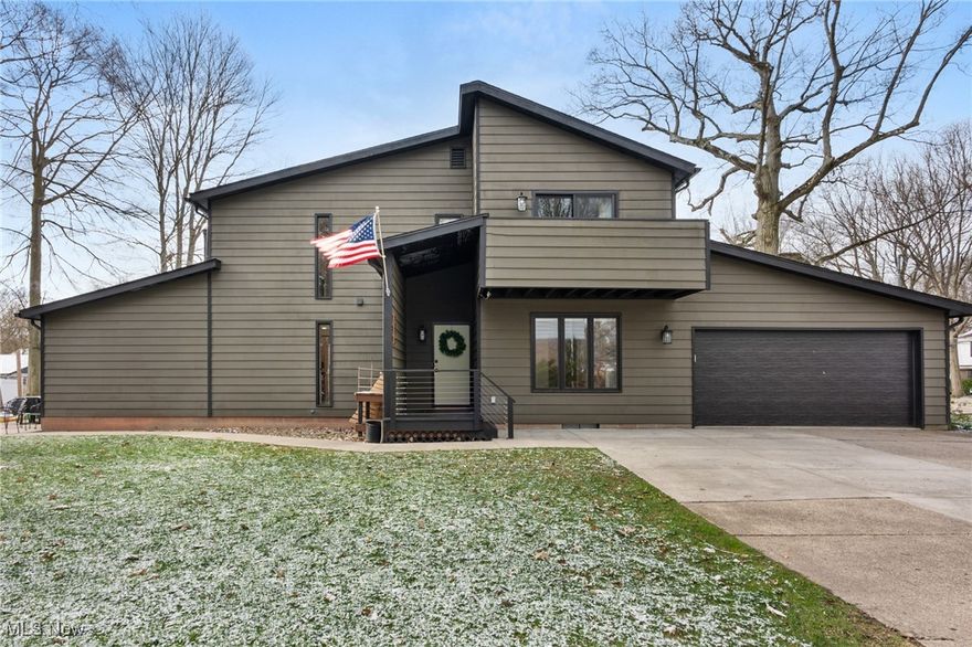 Welcome to 3328 Edington Road—a place where comfort meets charm in one of Fairlawn’s most loved neighborhoods. This thoughtfully updated 3-bedroom, 2.5-bath home offers nearly 1,900 square feet of living space, nestled on a peaceful, wooded 0.34-acre lot. Step inside and you’ll feel right at home. The remodeled kitchen (2024) is fresh and functional, complete with a reverse osmosis water filtration system—perfect for casual breakfasts or weekend baking sessions. In the living room, vaulted ceilings and a cozy wood-burning fireplace create an airy yet inviting space to gather and relax. Don't miss the first floor laundry and mud room right off the garage as well! Upstairs, the updated primary bathroom (2023) offers a serene escape, while refinished hardwood floors throughout add warmth and character. You’ll also love the bright and cheerful family room and a poured concrete patio just waiting for summer dinners and stargazing nights. The backyard is a quiet retreat, complete with blueberry and raspberry bushes and partial fencing for a little extra privacy. The 2-car attached garage includes electric, a brand-new door (2024), and plenty of room for tools, toys, or extra storage. Located in the award-winning Copley-Fairlawn School District, this home is just a short stroll to the neighborhood park, pool, and elementary school—connected by friendly sidewalks that make the area feel like home. Whether you're settling into your first home or looking for a place to grow, this one checks all the boxes!