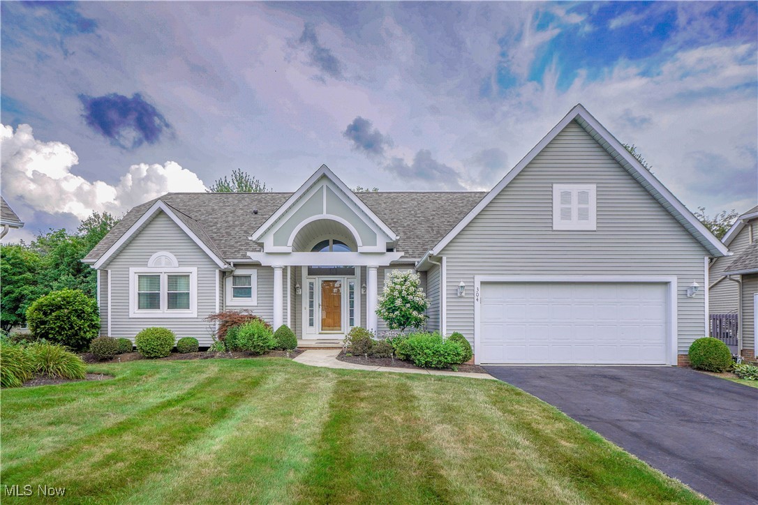 Welcome to easy living without giving up space or privacy! This exceptionally kept detached ranch sits within the sought after Briarthorn Condominium Association, combining the low maintenance benefits of condo ownership with the feel of a standalone home. Step from the covered front porch into a vaulted foyer with hardwood floors that flows into an airy great room highlighted by a gas fireplace and classic brick hearth—perfect for cozy evenings or relaxed entertaining. Your first-floor primary suite is tucked to one side for privacy and features dual closets and an en suite bath with a walk-in shower. A guest bedroom and full bath are adjacent to the Primary suite. The eat in kitchen is filled with natural light and opens to the back deck through sliding glass doors, extending your living space outdoors. All stainless-steel appliances stay, making move in easy. A main level laundry room, which includes washer and dryer, adds everyday convenience. Downstairs, the finished lower level expands your options—use the large rec room for media, hobbies, or game nights, and take advantage of a roomy office or potential guest space as your needs evolve. Enjoy comfort, flexibility, and low maintenance living with Wadsworth Schools. Come see it!