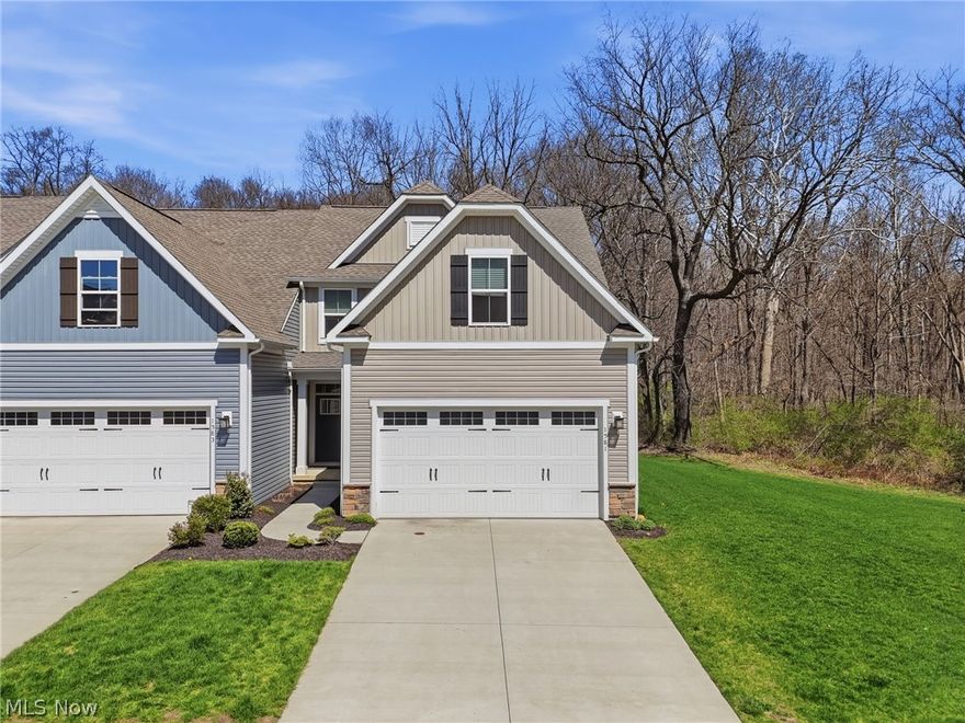 Welcome to 1581 Mud Brook Ct! A beautifully situated townhouse offering comfort, convenience, and one of the most scenic settings in the area. This well-maintained home built in 2022 features a bright and inviting layout with spacious living areas, generous natural light, and thoughtful design throughout. The kitchen flows seamlessly into the main living space, making it perfect for both everyday living and entertaining. First floor master suite, separate first laundry room, and a first floor half bathroom gives you everything you may need on one floor! Upstairs bedrooms along with a full bathroom are comfortably sized, and the home offers ample storage along with modern conveniences. On the lower level you’ll find an unfinished basement just waiting for your own personal finishing touches! Equipped with plumbing for a bathroom and an escape window for 4th bedroom! Step outside and you’ll immediately notice what truly sets this property apart! One of the standout features of this townhouse is its exceptional location backing directly to the West Creek Conservancy and Ohio & Erie Canal Towpath Trail. Enjoy a stunning, peaceful view of the towpath and creek right next to the property from the TimberTech back deck! A rare and highly desirable setting that offers both privacy and a connection to nature. Whether you're relaxing on your deck, enjoying morning coffee, or unwinding at the end of the day, the tranquil scenery creates a truly special living experience. With easy access to walking, biking, and outdoor recreation, this home is perfect for anyone who values both convenience and natural beauty. Don’t miss the opportunity to own a townhouse with one of the best views in the Merriman Valley!