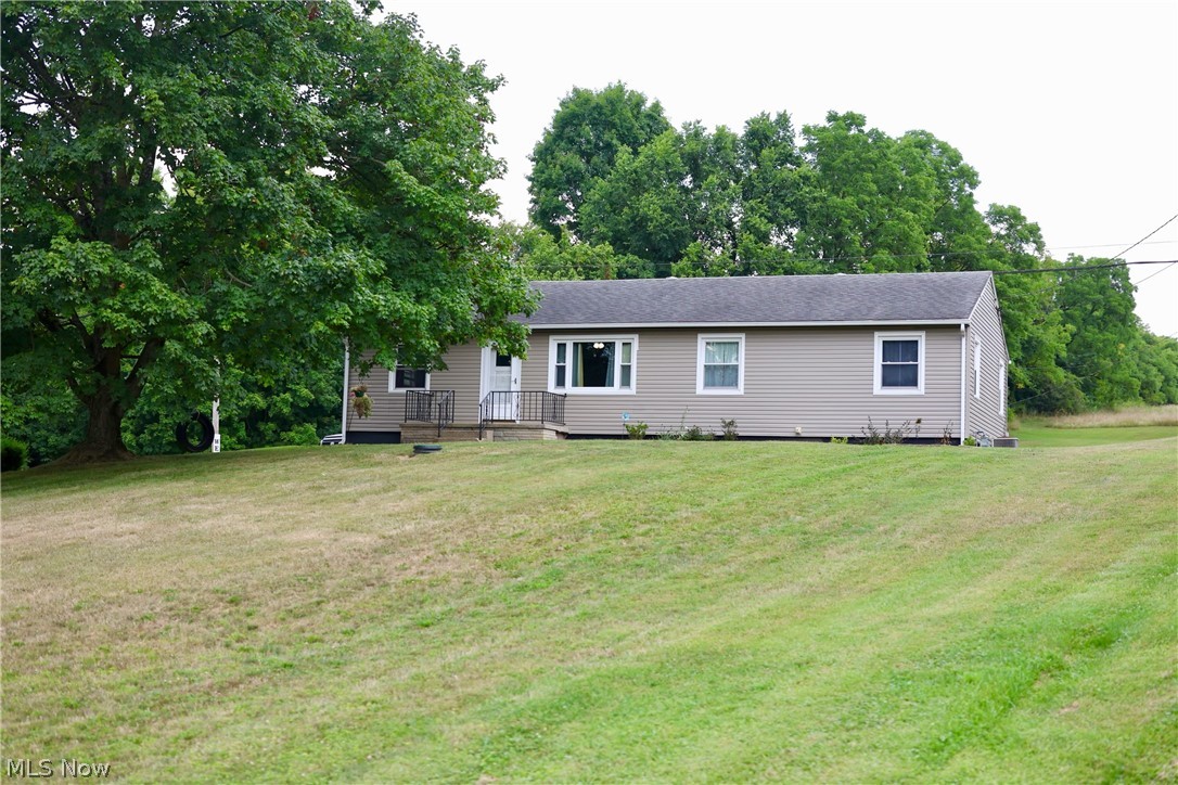 Take a look at this adorable, move in ready home in Maysville School District. This home offers 3 bedrooms, possible 4th in basement 1 bath, with main floor laundry and gorgeous hard wood floors throughout. The kitchen has been updated with new counters, cabinets, sink and fixtures. As well as the bathroom. The outside has been meticulously cared for with mature landscaping, new siding and an amazing 3 car garage!! Home is situated on almost an acre which gives plenty of room to enjoy the outdoors. Seller is leaving the newly built playhouse/swing for the new buyers as well as shed, washer, dryer, range,refrigerator and dishwasher. Possession will be immediate for the new owner so you can just move right in.