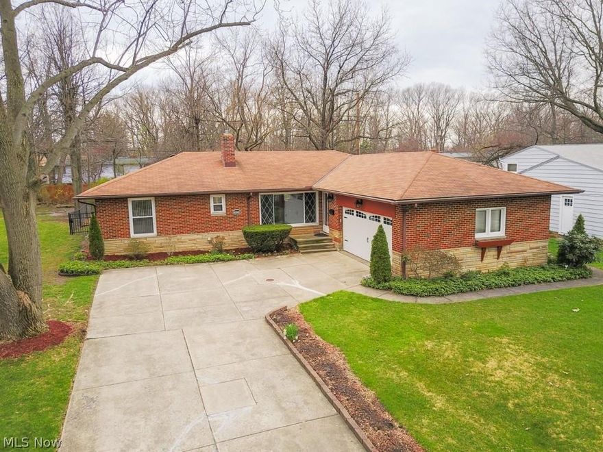 Pride of ownership shines throughout this truly ELEGANT & STUNNING brick ranch styled home. With its mature beautiful manicured landscaping (Fenced yard w/relaxing patio), home was recipient of the prestigious Cleveland Hts 2017 Community Improvement Award. Large/Open family rm offers custom wood burning fireplace Attractive coved ceiling detail Huge picture window allowing light filled charming room Connected formal dining rm encased by beautiful French doors leading to Added living room/all season sunroom overlooks gorgeous rear yard w/door leading to private patio. Spacious updated custom maple eatin kitchen w/ample counter space is perfect for the gourmet cook w/built in china cabinet which would serve well as an espresso/desk/work station. 1st floor laundry w/additional laundry in basement Remodeled powder room is sure to delight. Bedrooms offer gleaming hardwood flooring. 1st is finished off with updated full bath. The full FINISHED lower level offers a massive recreation room wi