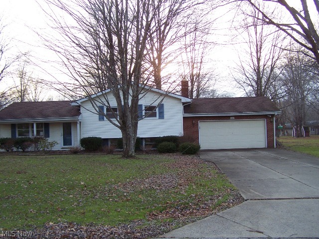 This is a unique floor plan featuring separate partial basements; one is off the living room, a fireplace in the family room, utility room, and entrance to garage. The other basement is off the family/media room, which also goes off to a tiered deck and patio. That part of the basement has the well pump and holding tank. This interior has recently been painted. New flooring, and a new gas furnace. Master bedroom has a shower bath. The hall tub/shower bath has a new counter and sink bowl. Kitchen has new appliances. Garage has attached workshop. Quiet street, less traffic. Must see. Close to freeway, shopping, restaurants, etc. This home will not last long, so be the first to view it. Please remove shoes during showings.
