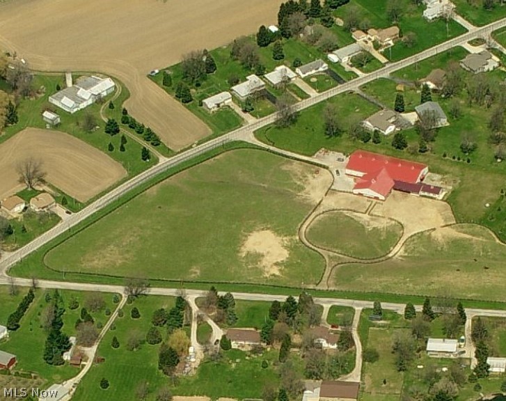 One of a Kind Horse Property with endless options, weather you want to start a business, or have a family horse retreat this is the property for you. 11 Stall Barn with Office, Bathroom, Tack Room, Feed Room, Wash Area, and a Large indoor Riding Arena. Additional Outbuilding, and Solid Oak Fence surrounding over 7 acres of rolling pasture leave endless options galore.