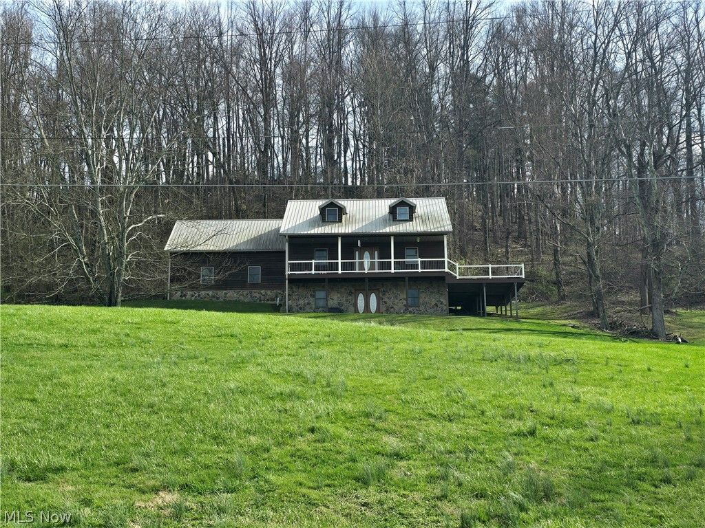 Photo of 1865 Cassingham Hollow Drive, Coshocton, OH 43812 (MLS # 5198150)
