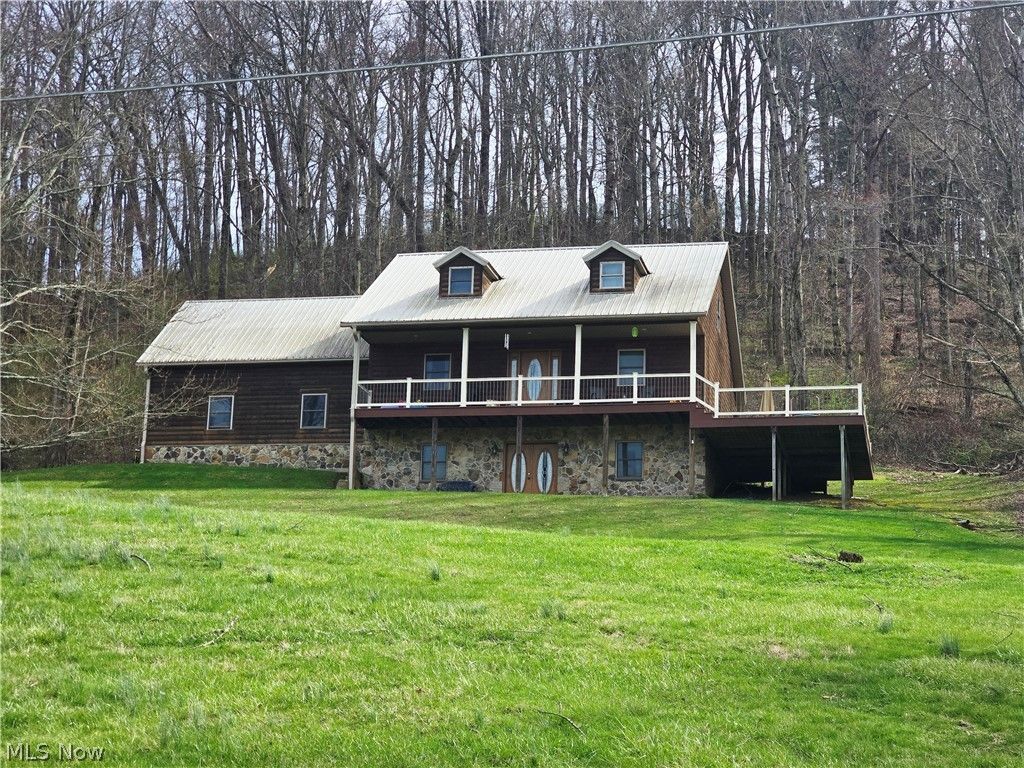 Photo of 1865 Cassingham Hollow Drive, Coshocton, OH 43812 (MLS # 5198150)