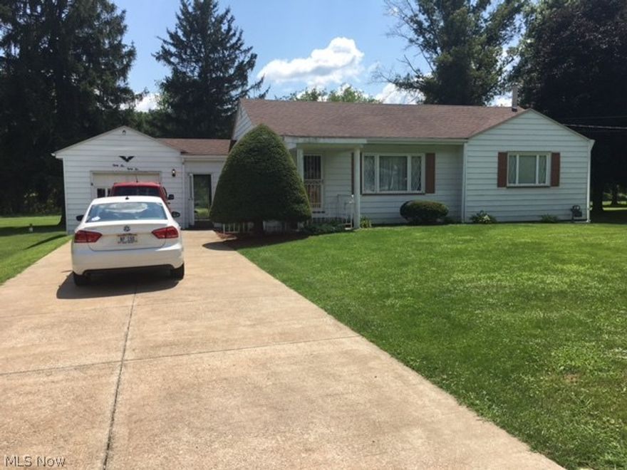 Beautifully maintained 2 bedroom ranch. Family says there are hardwood floors. Formal dining room has a built in cabinet,large eat in kitchen with all appliances staying. Attached garage opens on to a breezeway, with entrance to kitchen.Large level lot.Lots of closet space, including doubles in the bedrooms, and a linen in bathroom.Additional stove and freezer in basement.