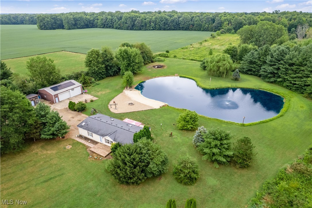 Welcome to this 3-bedroom, 2-bathroom ranch-style home located in Mount Gilead, OH. This lovely home sits on a sprawling 9.18-acre lot, offering plenty of space for outdoor activities and relaxation. The property features a large fountain pond with beach perfect for fishing or enjoying a peaceful afternoon by the water.
As you enter the home, you'll be greeted by a spacious living room that leads to a large kitchen with ample storage space and a utility room. The main floor also features a primary bedroom with an en-suite bathroom, as well as two additional bedrooms and a full bathroom.
The finished basement provides additional living space, perfect for a home office, game room, or additional bedroom. The exterior of the home boasts mature landscaping and ATV riding trails, providing endless opportunities for outdoor recreation.
The property also includes a 45x35 concrete floor 3-car garage outbuilding, perfect for storing vehicles, equipment, or using as a workshop. Additionally, the home features solar panels, providing energy efficiency and cost savings.
Updates to the home include a new roof in 2009, a new well pump and sand filter in 2023, new laminate floors in 2024, and a new propane furnace in 2016.
Don't miss out on the opportunity to own this beautiful property with endless possibilities. Schedule a showing today!