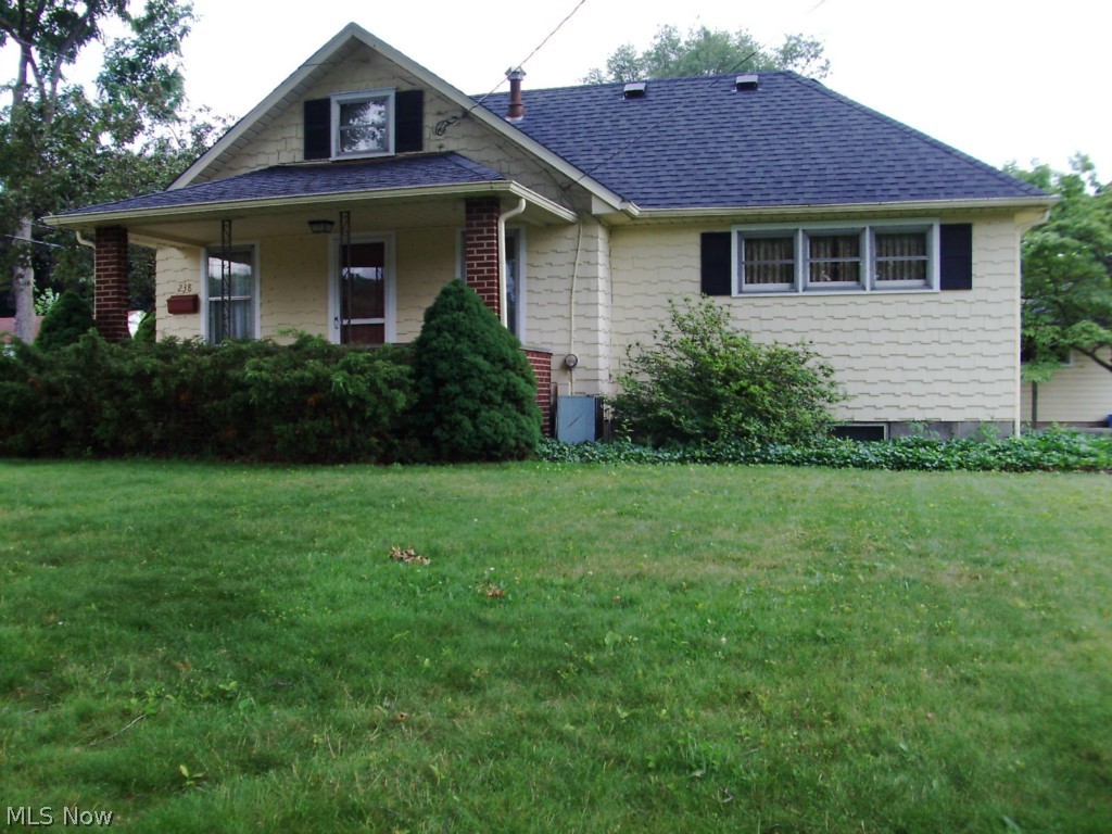 Excellent opportunity! Feels much bigger than you expect it to because the living room and eat-in kitchen are very roomy.
3 Bedrooms, 2 are small but a built-in bed and storage area helps and there is upstairs storage in the walk up attic.
Garage is 2 car size, but single door with 1/2 used for work area and storage. A covered patio is attached and looks out towards the extra lot, which has a drive for added parking when you need it. Basement and kitchen are easily accessed from the driveway.
Rec room in basement with closet areas, and a full bath in the unfinished side.
Roof was replaced in approx. 2007
Lot size approx. 90X120 please have agent verify.