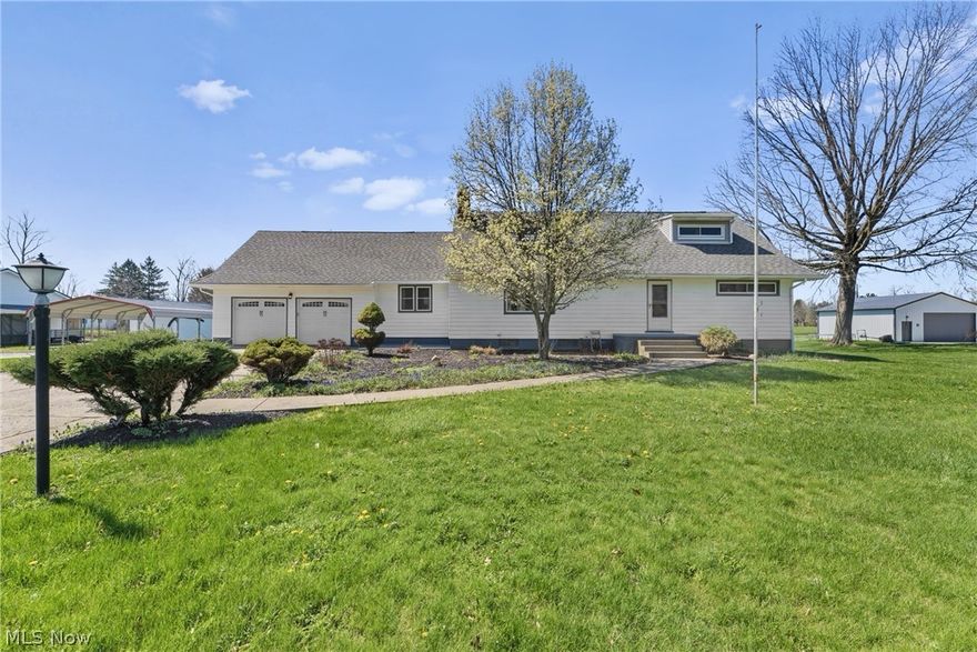 Welcome to 4423 Broadway, where classic charm meets modern comfort on a sprawling one-acre lot. As you step inside, you’re greeted by the warmth of rich hardwood floors and a spacious living room anchored by a cozy wood-burning fireplace—the ultimate setting for everything from quiet evenings to lively weekend gatherings. The floor plan flows effortlessly into the eat-in kitchen, featuring a dedicated coffee bar for your morning coffee and ample counter space for meal prep magic. Just steps away, the formal dining room sits adjacent to a private den, offering the ideal layout for both holiday feasts and everyday relaxation.

The main level also hosts two bright, versatile bedrooms—perfect for guests or the home office of your dreams. Head upstairs to discover the ultimate retreat: an expansive primary bedroom that serves up major built-in character and total privacy. It’s joined by a fourth bedroom and a completely remodeled full bathroom that evokes a high-end spa vibe for your daily "me-time."

The living space keeps going in the finished basement, a versatile area perfect for epic movie nights, featuring a second wood-burning fireplace and plenty of storage to stay organized. Outside, the home truly steals the show with a massive deck overlooking your private acre of land, offering a quiet, country feel while being only minutes away from the expressway. This peaceful setting is just waiting for summer BBQs and golden sunsets, with mature blueberry bushes tucked into the landscape that produce a fresh harvest year after year. Rounding out the practicality is a two-car attached garage, a convenient turnaround driveway, and an additional carport for all the extra coverage you need. 4423 Broadway is a true show stopper! Don't miss it!