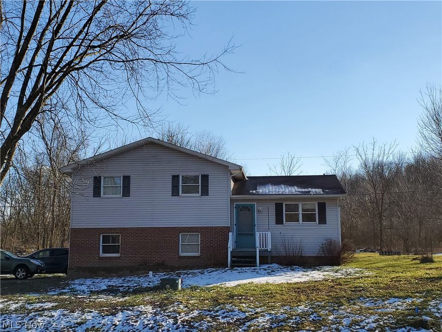Large yard just under 1/2 acre for this 3 bedroom split level home minutes from the highway. Make it your own - lots of potential. New septic 2020, remodeled bath. $2,000 carpet allowance with full price offer. $6.00 tax assessment Muskingum Conservancy.
