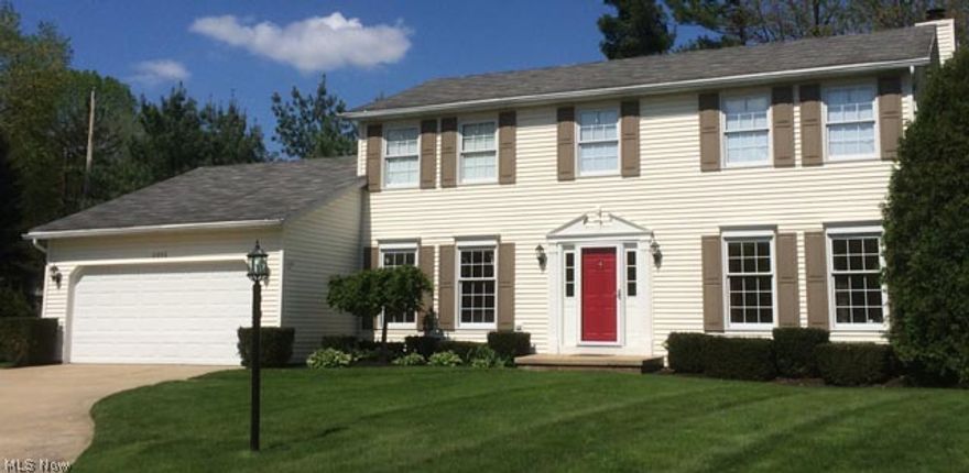 Lovely updated two-story colonial in perfect cul-de-sac location features modern colors & design!  Hardwood floor in welcoming foyer.  Large eat-in Kitchen with granite counter top w/upgraded backsplash, slate colored ceramic floor, & stainless steel appliances.  Formal Living Room & Dining Room.  Spacious & open step-down Family Room has cozy gas fireplace.  First floor bedroom/office with new hard wood floors and convenient first floor Laundry.  Master Bath features granite counter top w/ double sinks, garden tub, & extra large linen closest.  Finished Lower Level with desirable home theater/media room complete with 100" screen & stage, large game room with bar, and an office/workshop space.  Close to shopping, restaurants, parks & bike trails.