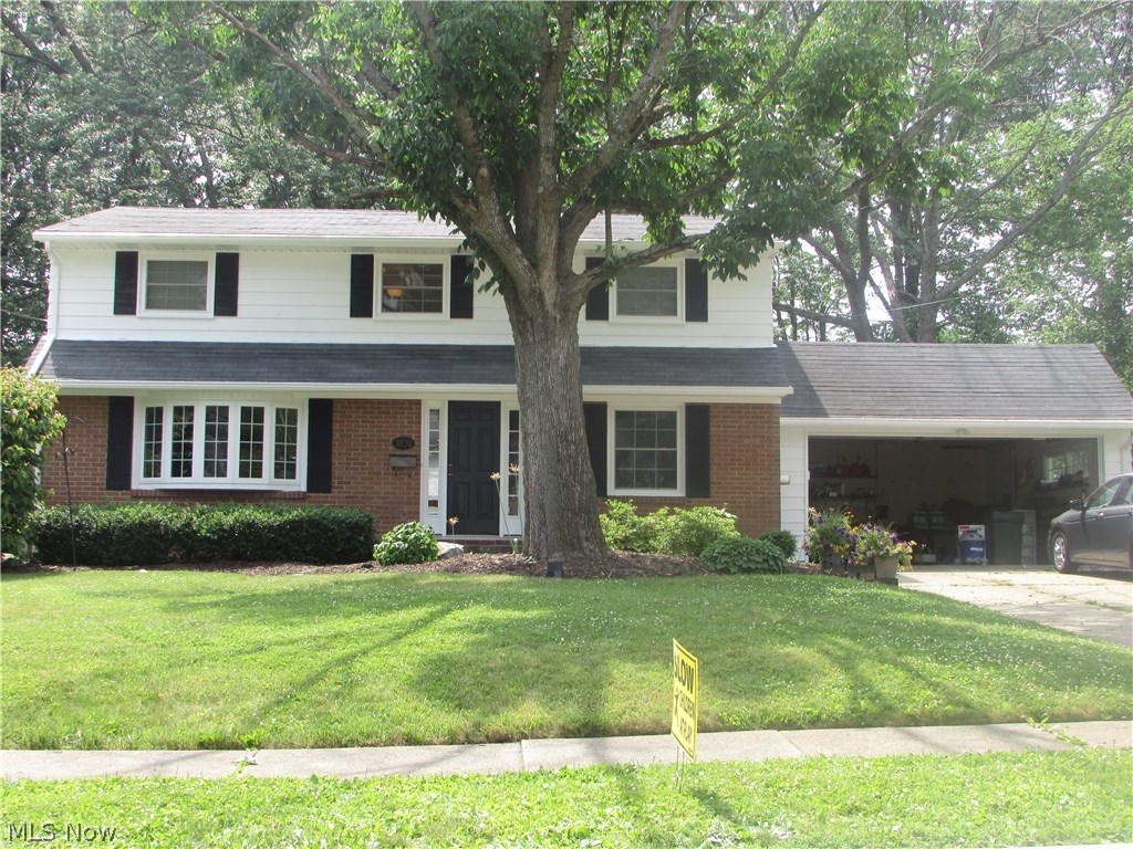 4/2.5 colonial with 2 car garage and updated. partially finished basement. Screened porch.