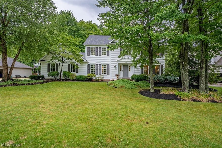 An unbelievable opportunity to own a well-kept, stunning 4-bedroom colonial in the Lakes of Aurora community! As you enter through the front door, beautiful hardwood floors, new carpet, & a large foyer greet you. Living room off foyer wraps into the family room.  Family room features a cozy fireplace and crown molding. Hardwoods stretch from the foyer through the kitchen & into the morning room. Kitchen features beautiful cherry cabinets with updated hardware, breakfast bar, stainless steel appliances, & flows into the morning room for extra seating - complete with another cozy fireplace & slider walking out to the 16x16 covered porch. A spacious formal dining room, a laundry room, & an updated powder room (quartz countertop & porcelain plank flooring) wrap up the main floor. All 4 bedrooms are upstairs. Master suite is large & open with vaulted ceilings, walk in closet, and ensuite bath. 3 additional bedrooms and updated full bath compliment the 2nd floor. The partially finished lower