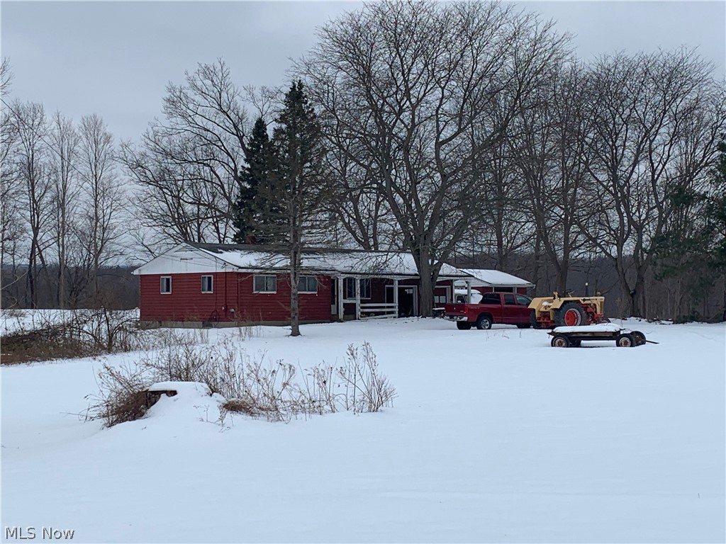 Riverfront 3 bedroom, 1 bath ranch, 2 car garage and outbuilding. This fixer upper is ready for your personal touch. Great potential. Excellent location across from Laurentia Winery and near River Rd Lake Metropark. Property is being sold AS IS.