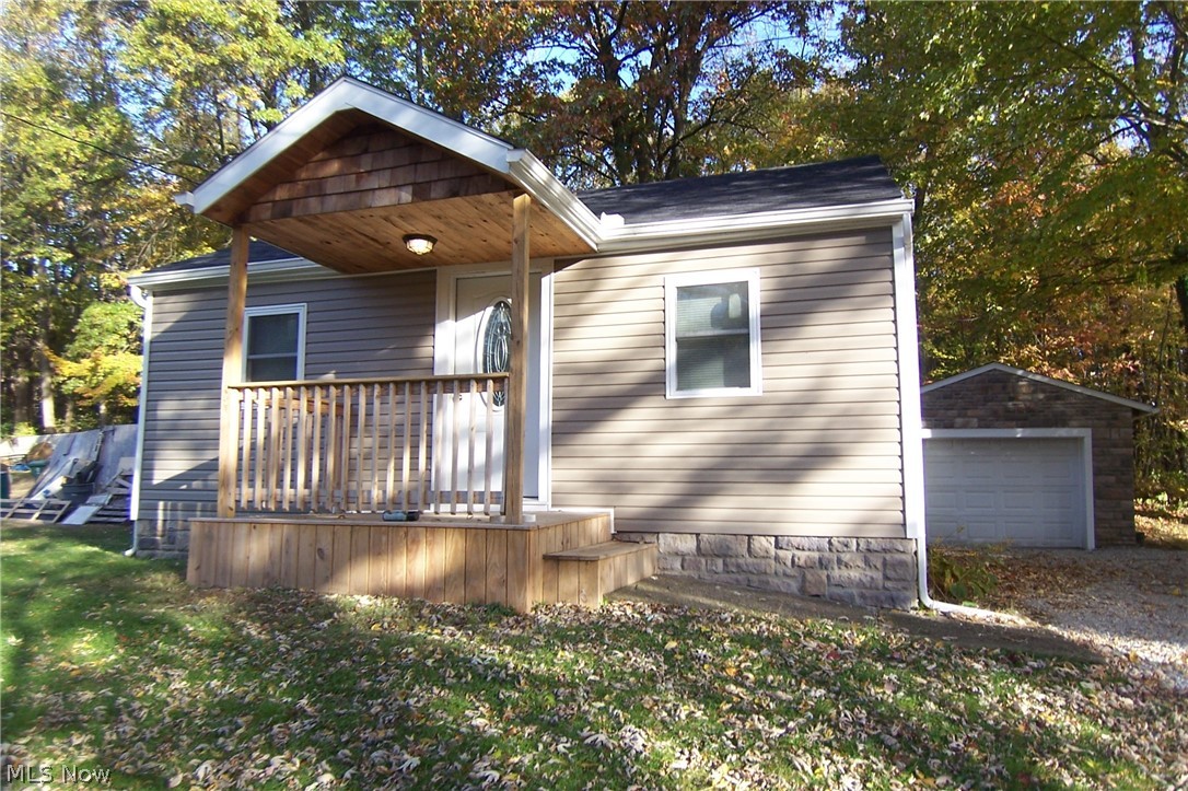 Completely remodeled open floor plan 2 bed ranch w/first floor laundry! 1 car detached garage w/opener! 2020 new roof! 2021 vinyl siding, windows, doors! 2021 furnace and CA! 2022 new carpet! Remodeled kitchen w/appliances! Remodeled bath and first floor laundry w/washer and dryer! Full basement for storage! Close to shopping/restaurants!