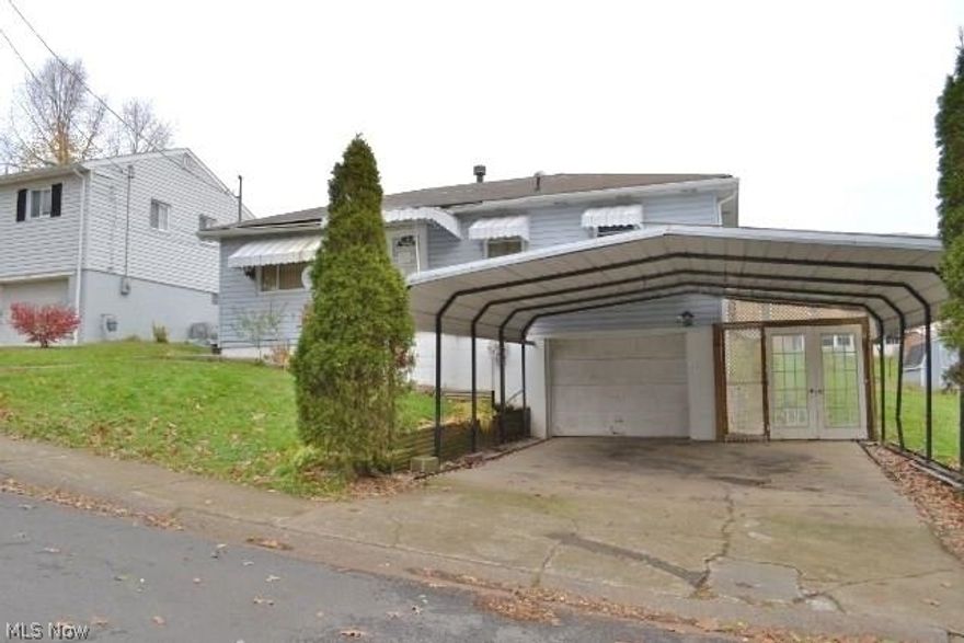A STEAL OF A DEAL!  3 BR, 1.5 bath ranch home on Weirton Heights and situated on 2 lots.  Includes a finished rec rm, central air, 1 car garage and 2 car carport.  Get there fast...it won't last long at 31,500!