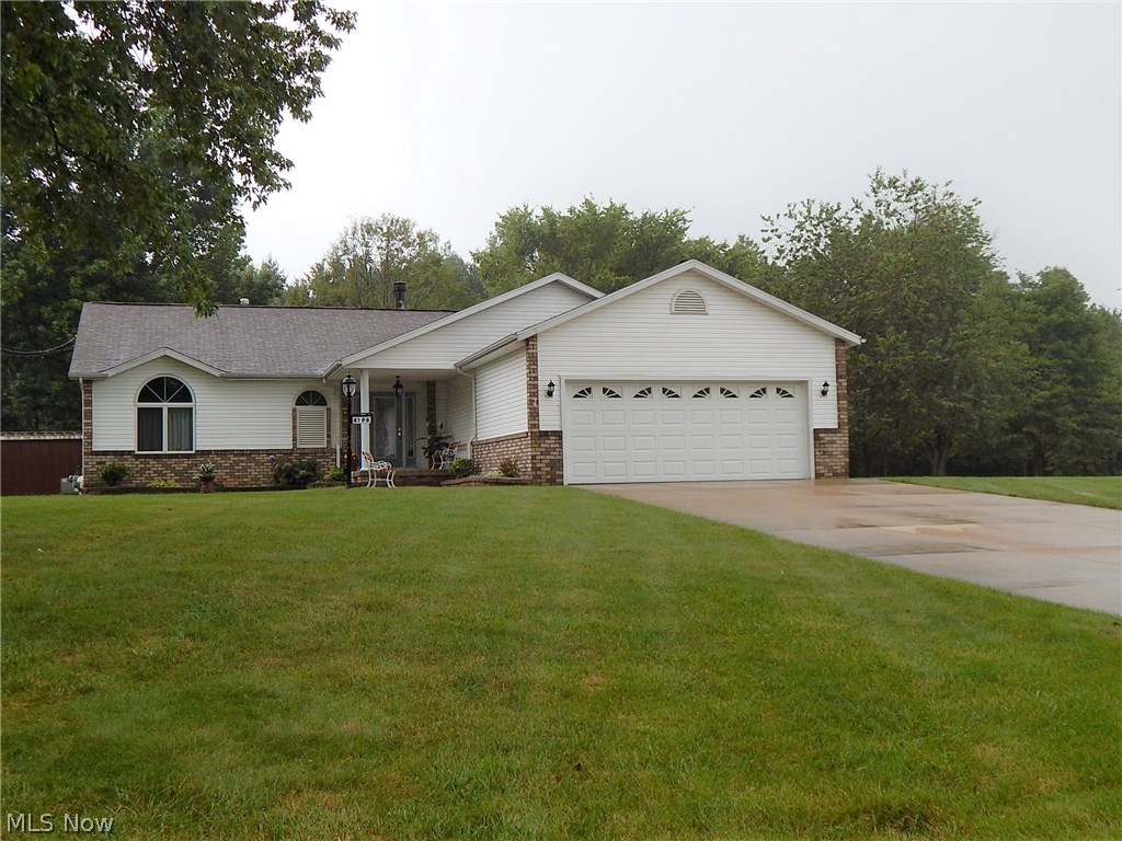 Perfect ranch as starter or to downsize on large double lot with mature trees to the rear. From the moment you enter the welcoming foyer and feel the open & airy floorplan*The Great Room has a dramatic vaulted ceiling, wood burning fireplace that is flanked by quarter round windows and view of the backyard*Formal Dining Room*Large country Kitchen with plenty of cabinets & counter space, all appliances and an eating area*There's a Sunroom off the Kitchen area with 2 sets of sliding doors to a large deck which leads to the beautiful backyard with lots of room to enjoy a garden, or space to play outdoor games!*Large Utility/Laundry room with cabinets above Washer & Dryer & leads to the Oversized 2 Car Garage with lots of storage areas*The bedrooms are located in a separate wing of the home*Large Master Bedroom with vaulted ceiling, a walk-in closet & large Master bath*Additional Bedroom & Full Bath complete the main floor*Downstairs you will find an enormous Rec Room with decorative Fire