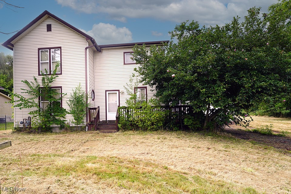 This four-bedroom home sits on a generous half acre lot with a country setting and conveniently located near 224 as well as Berlin Lake. The main floor offers a kitchen, living room, family room, full bath, laundry, a large first-floor primary bedroom with a sliding glass door leading to the back deck. Upstairs includes three additional bedrooms, each with double closets.
Additional features include a full walkout basement, gas furnace, central air, and an enclosed porch/breezeway off the kitchen that connects to the one-car attached garage. Front and rear decks provide outdoor space with character.
Solid structure with great layout. Bring your vision and restore this home to its full potential.
