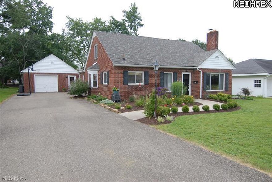 Be the first to purchase this fabulous 3 bedroom  brick home located on the North End with fantastic up dates ready for you to move in to. Great room offers beautiful and carefree engineered hardwood (decorators den) floors.  Custom Surround Sound by Niles and Paradigm Speakers. Fireplace with built in shelving.  Custom kitchen cabinets, multi-colored tile floor, bay window in breakfast nook shows off natural lighting.  Convenient first floor laundry/utility room. Two bedrooms on first floor with full tile bathroom.  36'x14' owner's suite with walk-in closet and private bath on 2nd floor. 20'x10' sunroom faces the back yard can be used for home office or work out area. Extra Parcel#85330134000