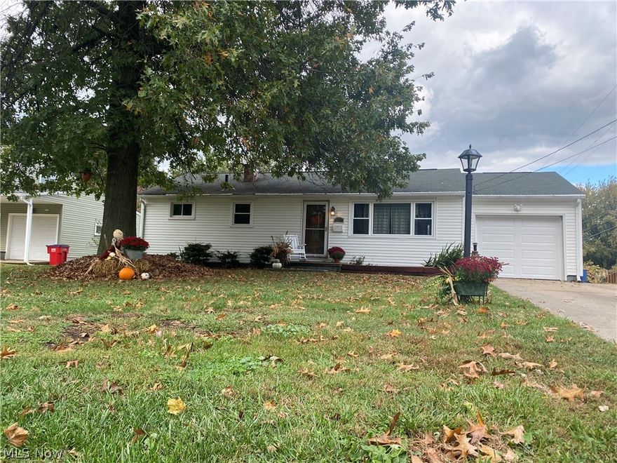 Charming, well maintained Perry Twp. Ranch located close to shopping and restaurants.  As you enter the home you will notice the natural light beaming in through the large picture window, and character of the built in shelving in the living room. The fully applianced kitchen has recently been updated, and includes a built in seating area complete with hidden storage.  You will find 3 of the 4 bedrooms on this level, as well as a full bath that even has a heated vent to keep you and your towels warm during cold, winter days. The basement is partially finished with the 4th bedroom, laundry area, half bath and bonus space that can be used as an office, rec area, etc. Enjoy the large, fully fenced in backyard and patio area directly from the walk-out basement. Other updates include new hot water tank Jan-22, concrete garage floor Oct-21, newer garage door and mechanics, freshly painted basement storage area. Welcome Home!!