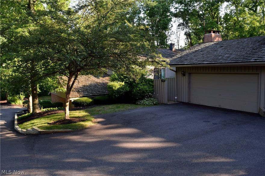 Looking for a "REAL" ranch with no steps or step downs except from the garage?  THIS IS THE ONE!! Spacious unit with unique features.  How would you like a beamed Cathedral Ceiling Master Bedroom with a Fireplace, 2 on suite full baths (one with large shower and one with a tub/shower) and a sliding door to a 17' x 14' deck overlooking woods and the Walden #9 Tee? Complement this with a beamed Cathedral Ceiling bedroom with full bath access and sliding door to the entry courtyard! A Formal Living Room features a 2nd Fireplace, large windows overlooking the woods and golf course and a door leading a deck off the Kitchen.  There is a Formal Dining Room off the foyer and Kitchen for more formal entertaining. An Eat-in Kitchen features Oak Cabinets, sliding door to a 13' x 11' deck with walkway to the Living Room and that overlooks the woods and golf course...highlighted by a 6' x 5' Skylight that fills the room with light! The laundry is conveniently located as you enter from the 2 car gar