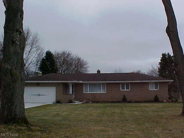 Wonderful 3 bedroom brick ranch with 1.19 acres. Kitchen updated, granite counter tops, breakfast bar, extra lighting, new cabinets all appliances. Baths updated, main bath has double sinks, tile tub/bath, and a shower in the lower level. Furnace and central air, electric box 2009. Rec. room in basement adds 574 square feet to the living area. Glass block windows in basement with plenty of storage and a work bench. Wood burner insert in the family room first floor. Three season room with great views. America's Preferred Home 1 year Warranty included. Ready to move in.