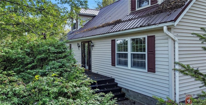 This beautiful home is filled with custom features throughout. Offering 3 spacious bedrooms and 2.5 baths, including a master suite with its own on-suite bath and laundry, this home sits on 1.44 private wooded acres. Inside, you’ll find a huge open kitchen with custom-built seating, custom drawers in the staircase for clever storage, stairway lighting and a walk-in pantry with shelving for easy organization. The property includes a vibrant four-season sunroom for year-round enjoyment. Enjoy the outdoors with a large back deck with ramp access, a fenced dog run, plenty of activities for kids including a playground and basketball hoop, and endless landscaping potential. A whole-house generator adds peace of mind. The oversized 4-car heated garage is a dream space—complete with built-in shelving, separate electric service, and plenty of room to customize a workshop or man cave. A concrete pad provides additional parking for a camper, boat, trailer, or extra vehicles, and a lawn shed is conveniently attached to the back of the garage. Located in the desirable Maysville School District, this home offers the best of country living while still being close to shopping and conveniences.