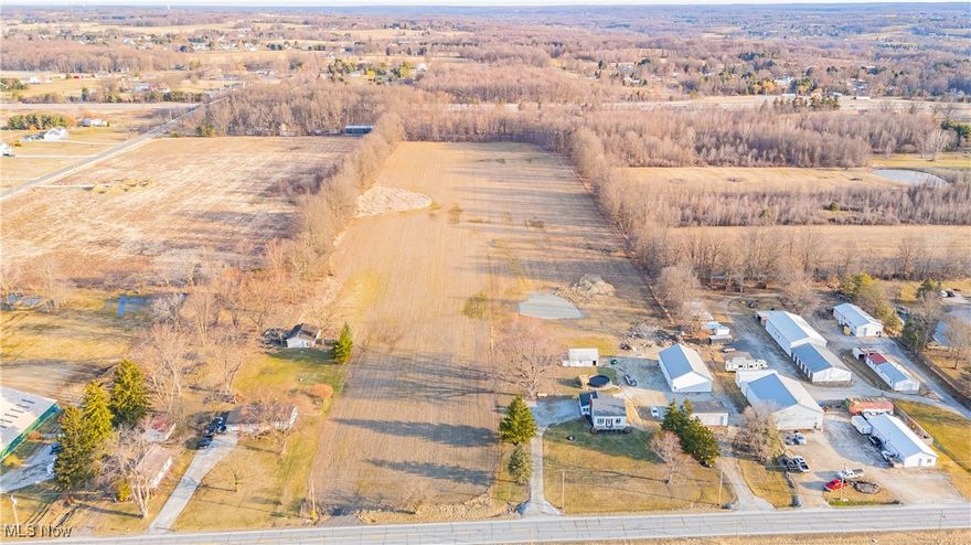 16.2 flat acres in Wadsworth!!! approximately 164' frontage and approx. 505' across the back.  Opens up to wider area about 730' back.  Lots of options:  Farming, commerical use, build a home.  Buyer to verify zoning.  Listed as 110 on auditors site: Agriculture/vacant land.  Current owner has been leasing annually to a local farmer.