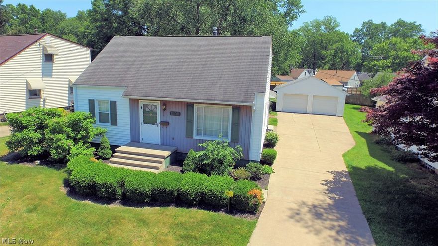 This spacious 4 bedroom 1.5 bathroom home offers much more living space than meets the eye. The bright, warm living room has plush carpet with hardwood floors underneath. Inside the kitchen you’ll find plenty of dark wood cabinets and a dishwasher. An offset dining area leads to the huge family room complete with fireplace and large windows including sliding glass doors showcasing the rear patio. This home offers two first floor bedrooms with carpet and hardwood floors underneath, and each also having nice closet space with natural wood doors. The main full bathroom is on the first floor. Upstairs you’ll find two very large bedrooms, again with natural wood trim, built-in dressers, and doors throughout. The upstairs half bath makes it easy for those crowded mornings. The walk-in attic is great for additional storage. The home’s full basement is also neat and clean with epoxy floor coating. Here you will find laundry and an additional shower. Outside offers a large detached two car gara