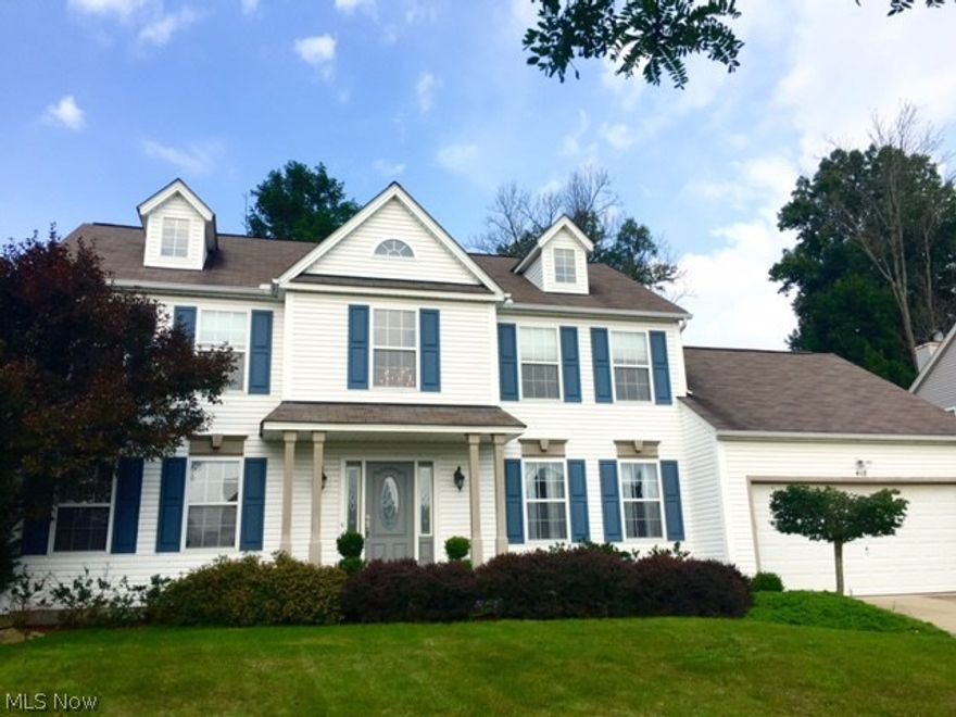 Stylishly updated 4 bedroom 2095 sqft colonial in wonderful Wintergreen development.   Live within walking distance of highly-rated Wadsworth schools, park, and new YMCA pool!  Enter to 2 story light-filled foyer flanked by pillared office/living room to the left and beautiful dining room with tray ceiling to the right.  Large and open eat-in kitchen with granite countertops, stainless steel appliances, beadboard detail and sliders to deck.  Large dinette open to family room - a great layout for entertaining. Crown molding in living room, family room and kitchen.  Half bath with granite-topped vanity and laundry with cabinetry off of kitchen.  Large and cozy family room with gas fireplace and tall windows to gorgeous backyard.  Enter through double doors to 2nd floor master bedroom with vaulted ceiling, his and hers closets (one walk-in), and well-appointed master bath with soaking tub and walk-in shower. Three additional spacious bedrooms upstairs.  Recently finished basement with pre